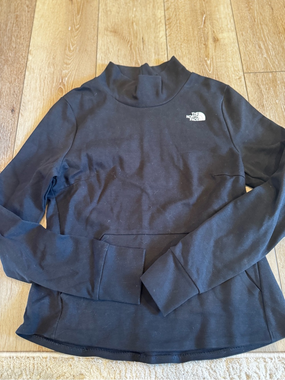 The North Face woman’s Black Turtleneck Pullover Sweater